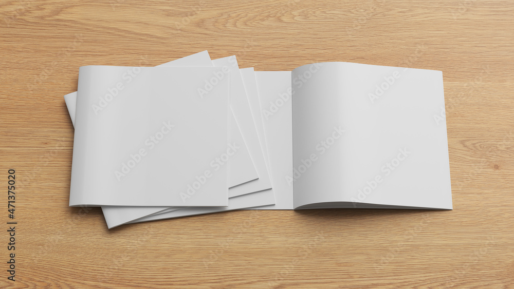 Square brochure or booklet mock up on wooden background. Square brochure or booklet mock up on wooden background.