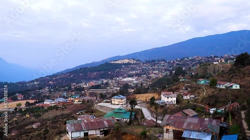 tawang city view from mountain top at dawn from flat angle video is taken at tawang arunachal pradesh india. photo