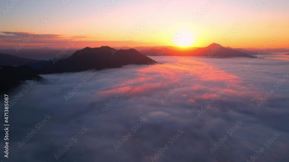 4K Drone flight over the clouds during sunrise. Sun is rising above sea of clouds until the horizon, bright weather and amazing nature landscape
4K Drone flight over the clouds during sunrise. Sun is rising above sea of clouds until the horizon, bright weather and amazing nature landscape