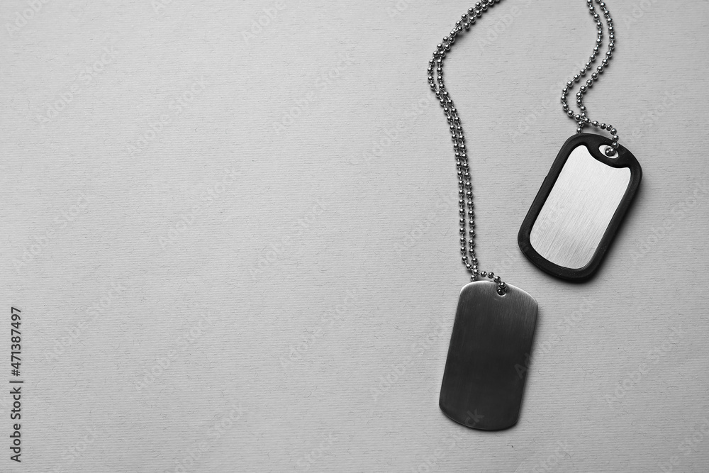 Fototapeta premium Military dog tags on grey background