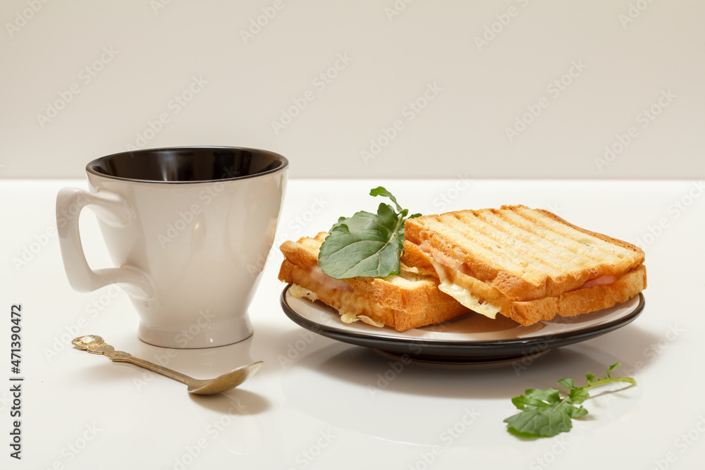 Homemade grilled cheese sandwiches for breakfast with cup of coffee. Homemade grilled cheese sandwiches for breakfast with cup of coffee.