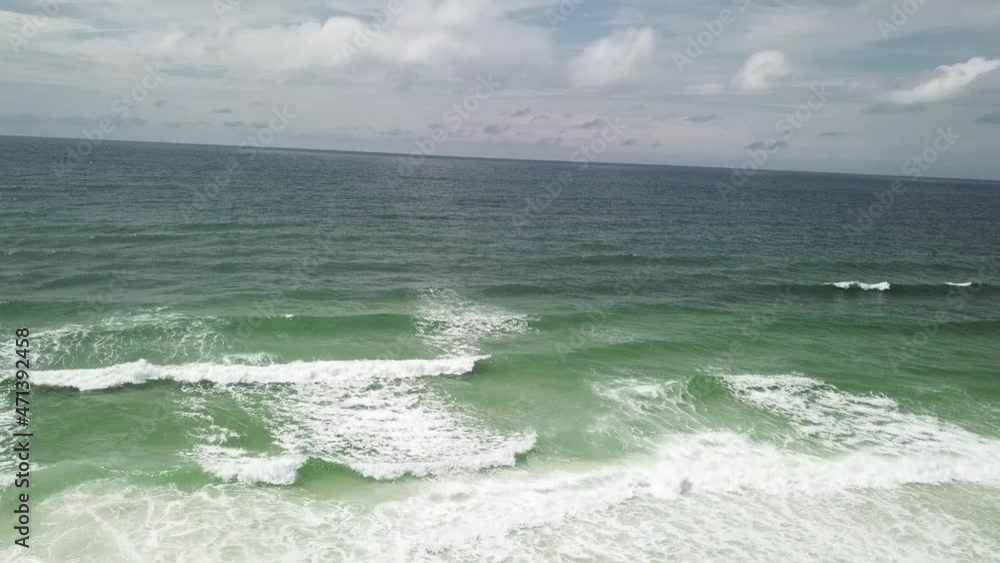 Deep Blue Sea Waters Splashing With Foamy Waves - aerial drone shot Deep Blue Sea Waters Splashing With Foamy Waves - aerial drone shot