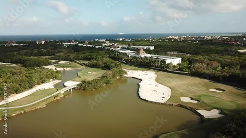 Panorama Of Nicklaus Design Golf Course With Lush Forest And Natural Inlet In Quintana Roo, Mexico. aerial photo