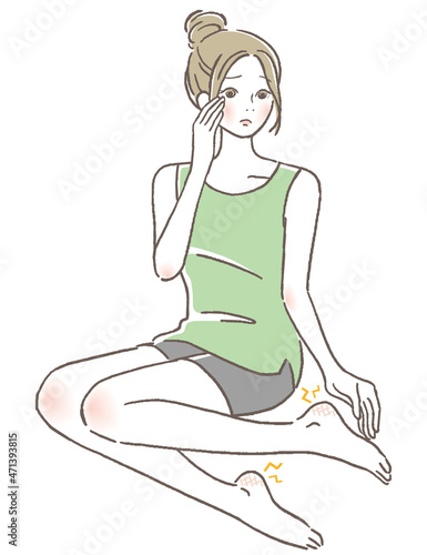 足を気にする女性
