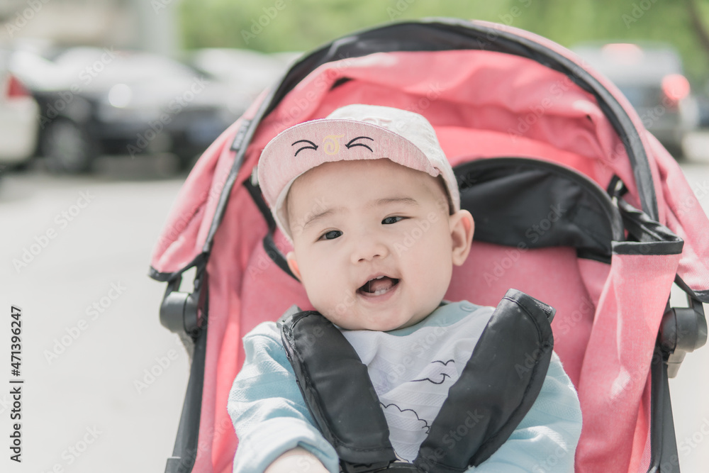 Baby enjoying sunshine outdoors Baby enjoying sunshine outdoors