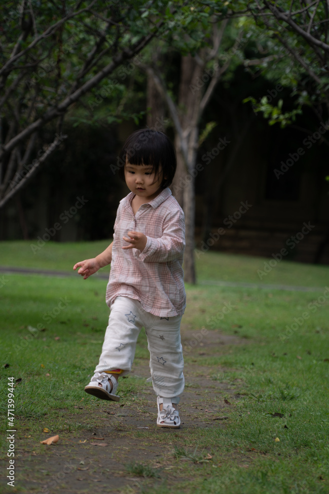 A girl playing outdoors A girl playing outdoors