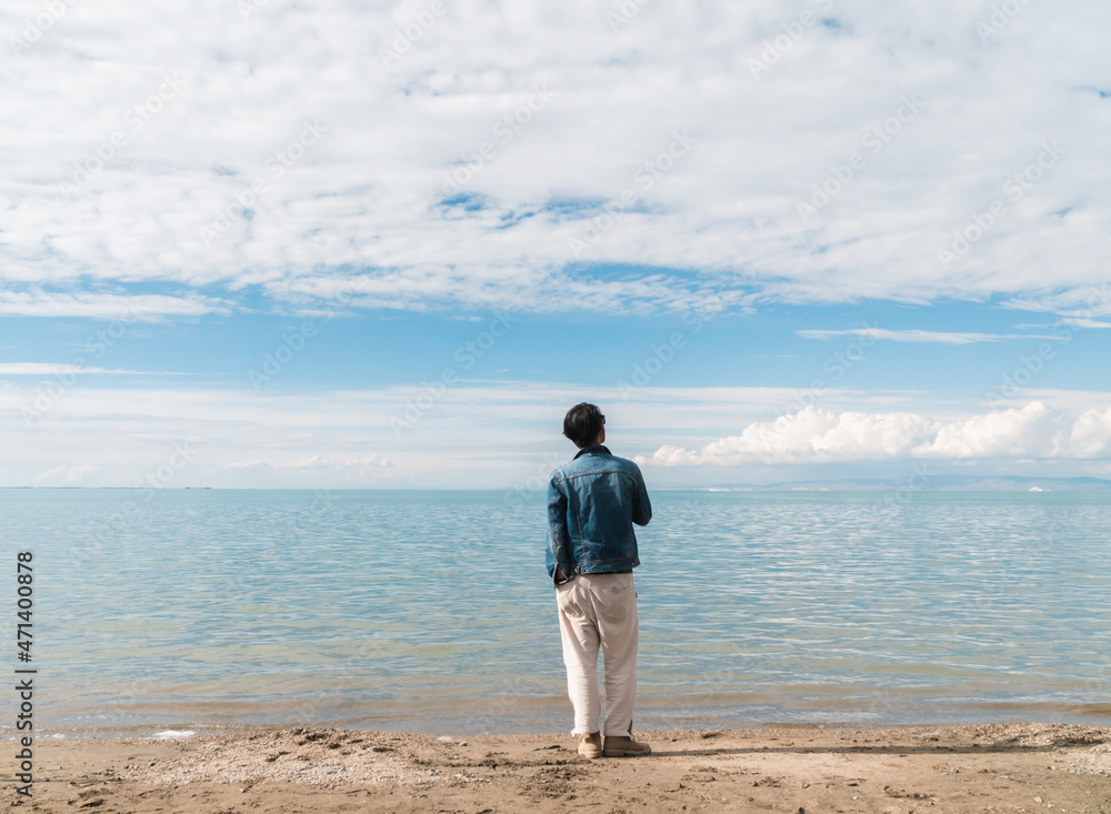 A man traveling in Qinghai Lake, China