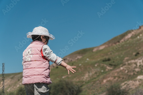A girl playing outdoors