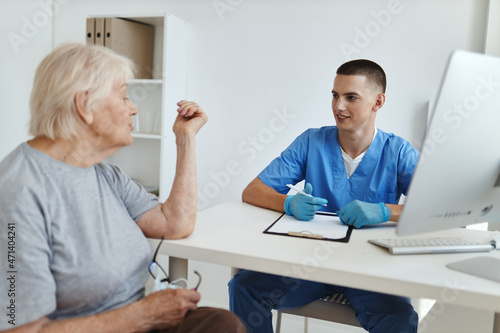 an elderly woman at a doctor's appointment diagnostics