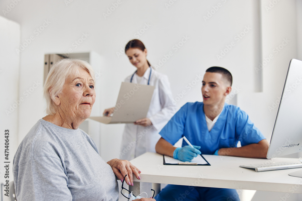 elderly patient communication with a doctor in the medical office elderly patient communication with a doctor in the medical office