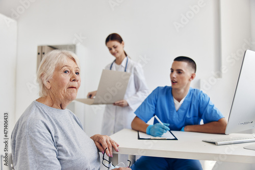 elderly patient communication with a doctor in the medical office