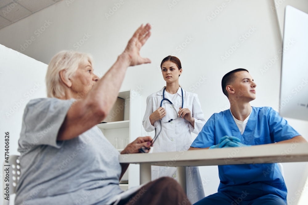 elderly patient at the doctor's and nurse's appointments health care