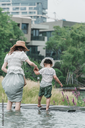 Mother and daughter playing outdoors