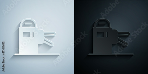 Paper cut Turnstile icon isolated on grey and black background. Paper art style. Vector