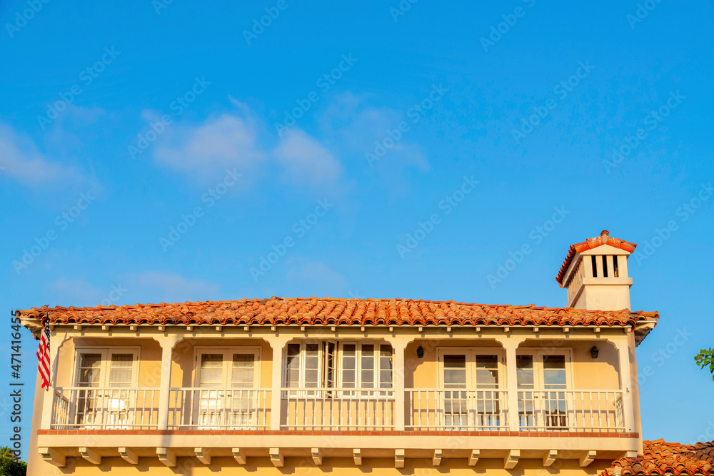 Terrace of a mediterranean style house with US flag at La Jolla, California