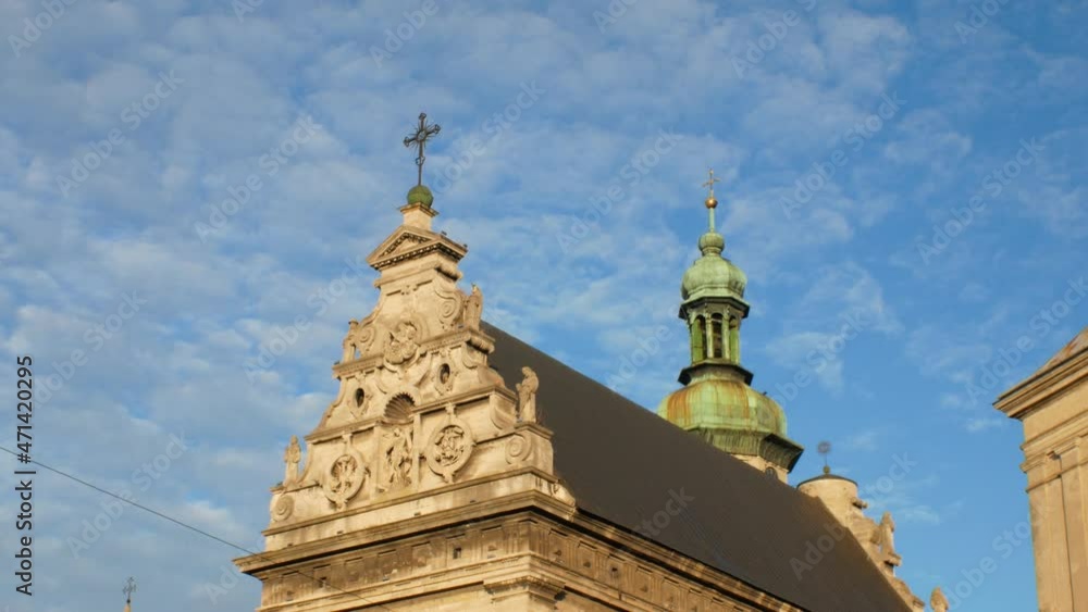 View on old european church spire in old city centre. High quality 4k footage View on old european church spire in old city centre. High quality 4k footage