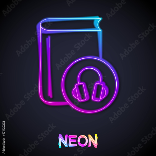 Glowing neon line Audio book icon isolated on black background. Book with headphones. Audio guide sign. Online learning concept. Vector