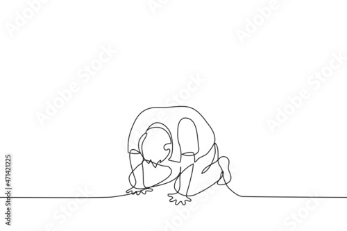 man with his head bowed lies on all fours on the floor - one line drawing vector. concept of suffering, devastation, crisis, despair, fatigue