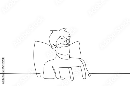 man sits in bed with back on pillow he is overtired or impressed with what he has read, glasses are out of sight - one line drawing vector. concept of overwork, shock, shocked, surprised