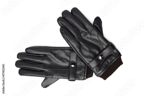Winter men's leather gloves lying on top of each other isolated on white