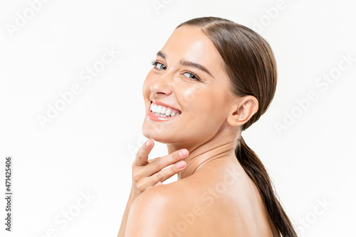 Beautiful Caucasian woman with fresh clear face skin in isolated studio white ba Fototapet