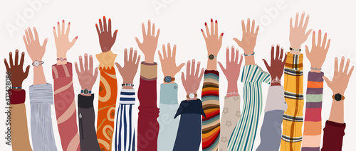 Group of raised arms and hands of multicultural people. Community or society of men and women of diverse cultures and races.Collaboration teamwork agreement between colleagues or friends photo