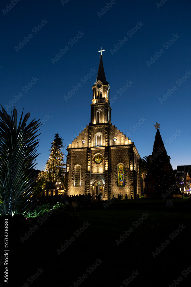 Gramado, Rio Grande do Sul, Brazil - November 20, 2021: night lighting of São Pedro church in the tourist city of Gramado Gramado, Rio Grande do Sul, Brazil - November 20, 2021: night lighting of São Pedro church in the tourist city of Gramado
