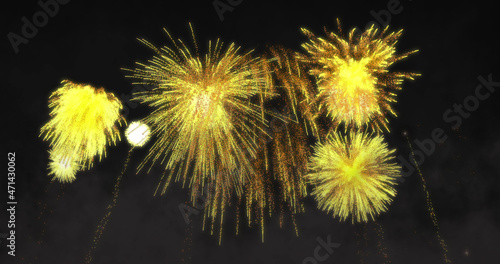 Image of yellow fireworks exploding on black background