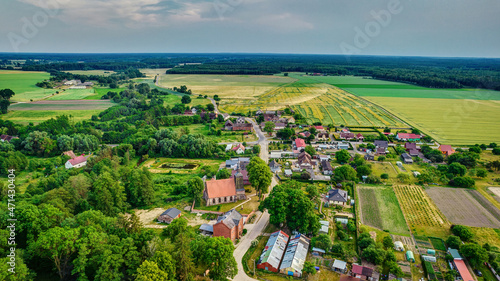 Landscape of polish village from above drone footage Kozielice gm Golczewo Poland Church © Bart