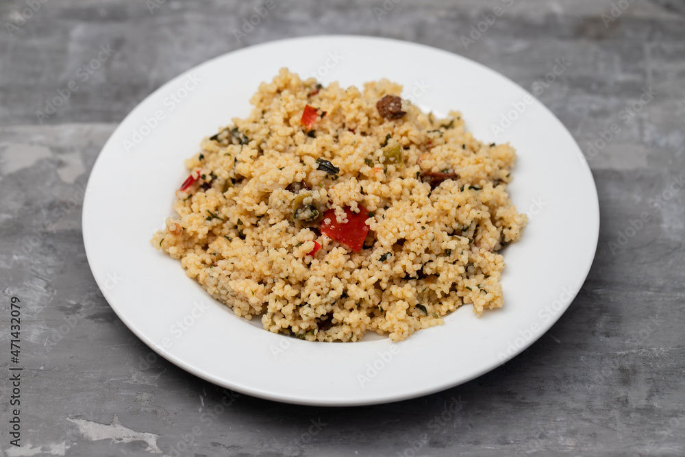 fresh tabbouleh on small plate on ceramic