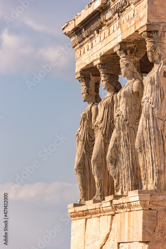 Caryatids and blue sky. The Erechtheion (Temple of Erechtheum) on Acropolis of Athens, Greece