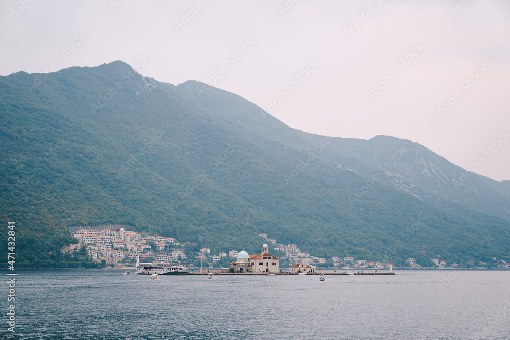 Church of Our Lady on the rocks against the background of Perast. Montenegro