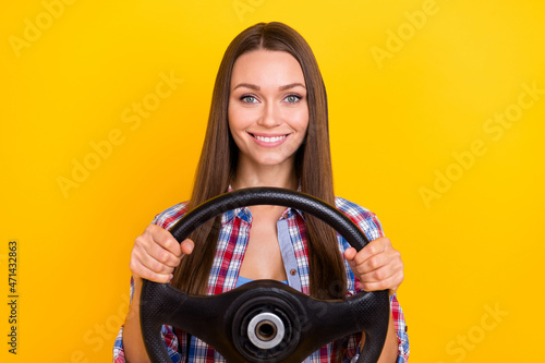 Fototapet Photo of positive lady hold steering wheel drive car wear checkered shirt isolat