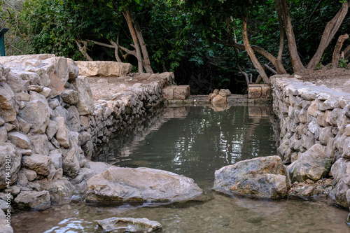 View of Rosh Pina stream at Nahal Rosh Pina reserve, the town of Rosh Pina, located on the slopes of Mount Kanaan in Upper Galilee of Northern Israel, Israel. photo