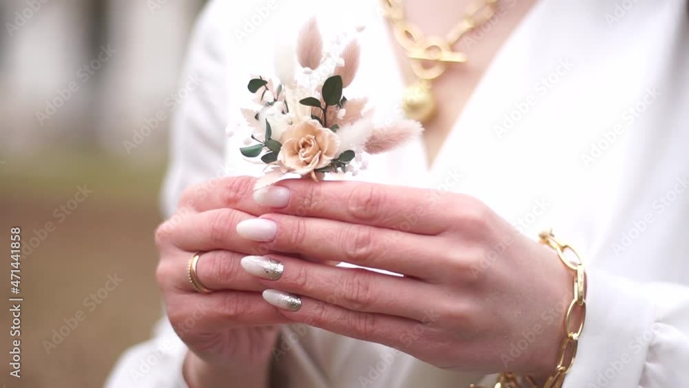 Wedding bouquet. Newlyweds.The bride and groom. Wedding floristry. Boutonniere. Wedding bouquet. Newlyweds.The bride and groom. Wedding floristry. Boutonniere.