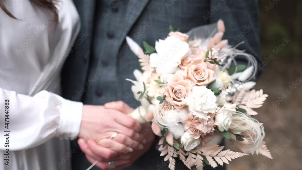 Wedding bouquet. Newlyweds.The bride and groom. Wedding floristry. Wedding bouquet. Newlyweds.The bride and groom. Wedding floristry.
