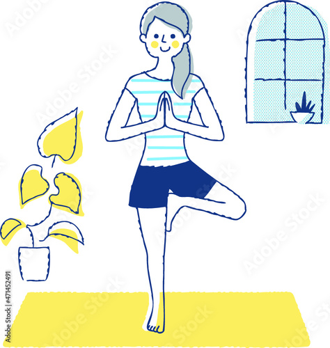 ヨガのポーズをしている女性