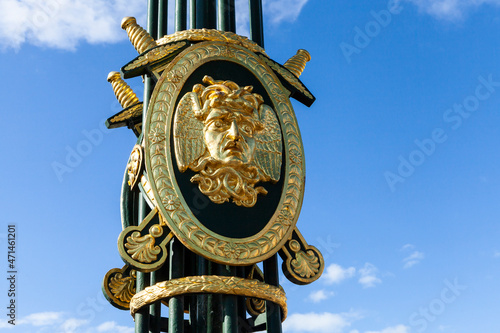 Bas-relief of the jellyfish Gorgon's head on the Panteleimonovsky Bridge in St. Petersburg photo