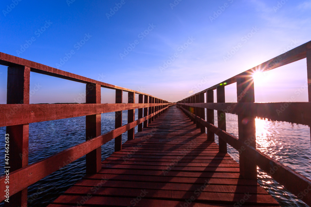 Beauty in nature red bridge long way and sunlight in morning landscape
