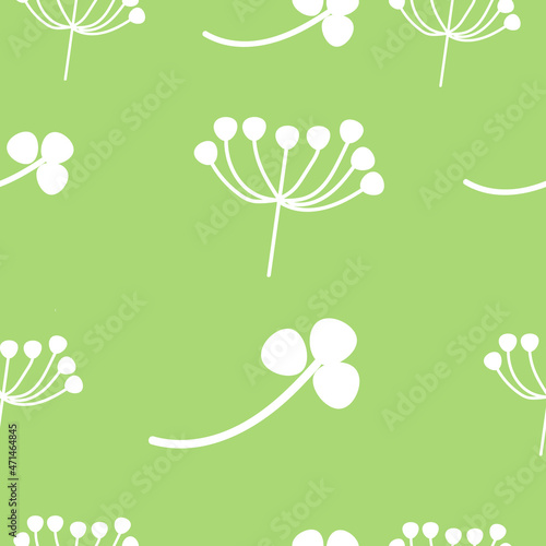 Pattern of flowers and inflorescences on a green background. Fabrics, packaging. Vector/