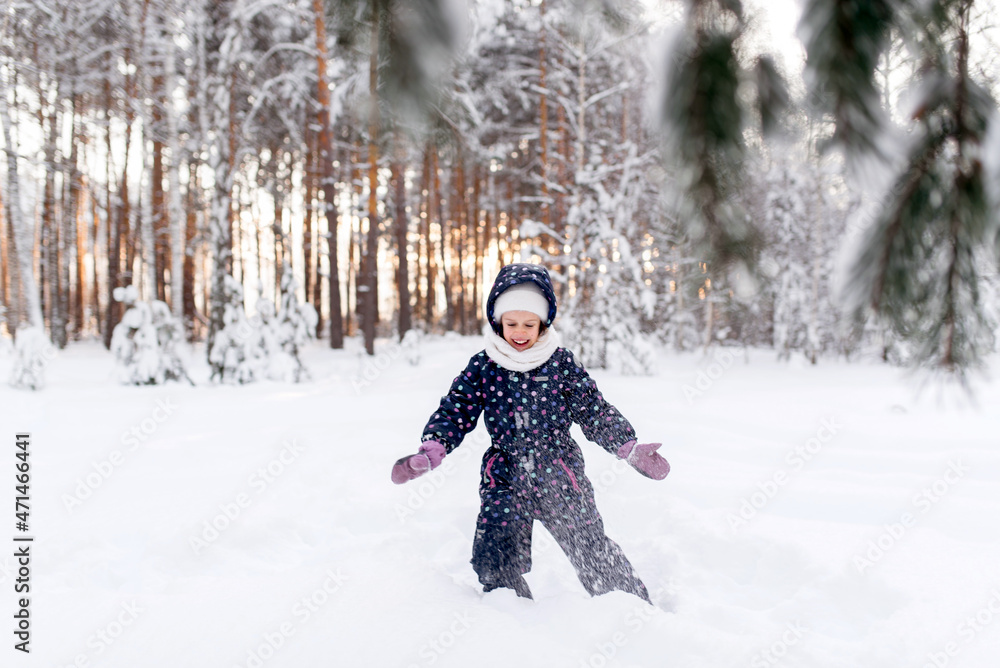 winter forest, snow forest, games in the forest, snowdrifts, children's overalls , girl in the forest
