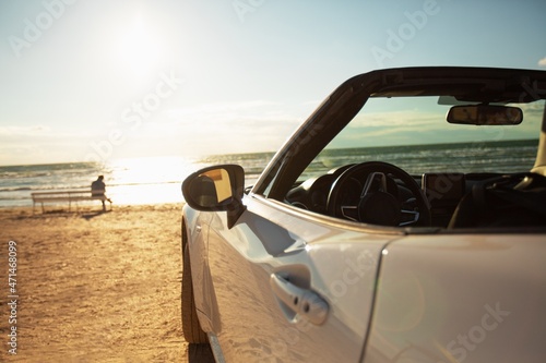 Exclusive car on sand road or beach in summer