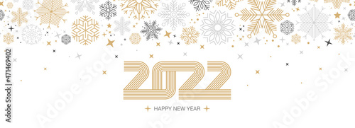 2022 greeting card on gold and silver snowflakes background