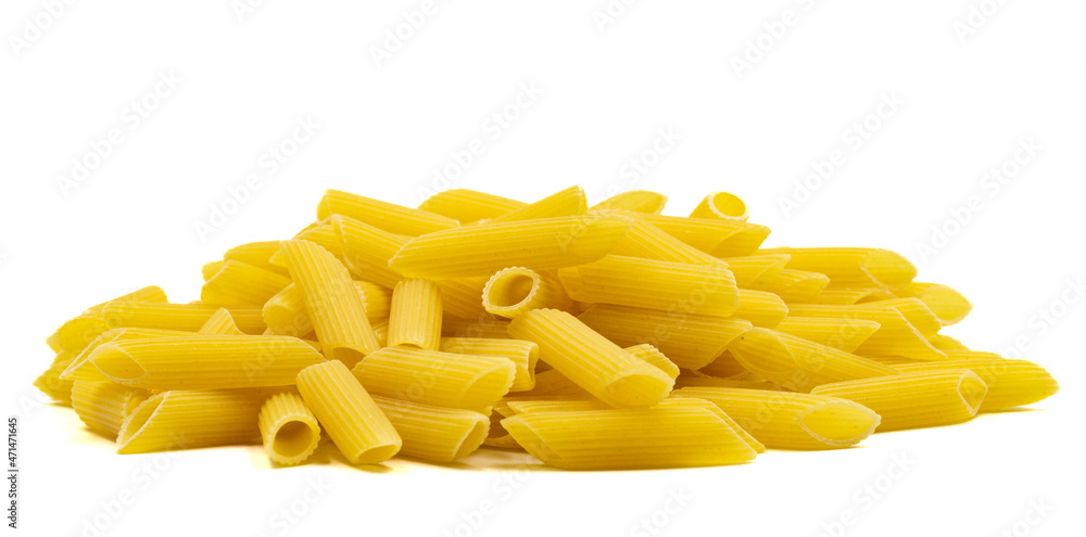 Raw penne pasta isolated on white background. Close-up. vertical view Raw penne pasta isolated on white background. Close-up. vertical view