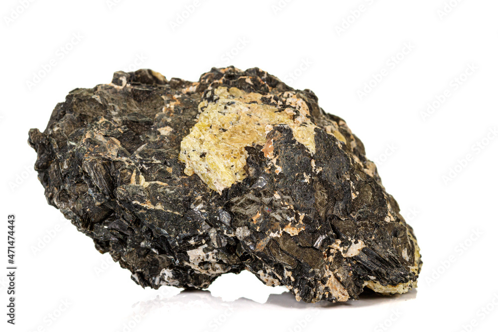 Naklejka premium Macro of a mineral stone Vesuvianite on a white background