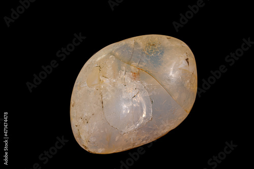 Macro stone opal mineral on a black background