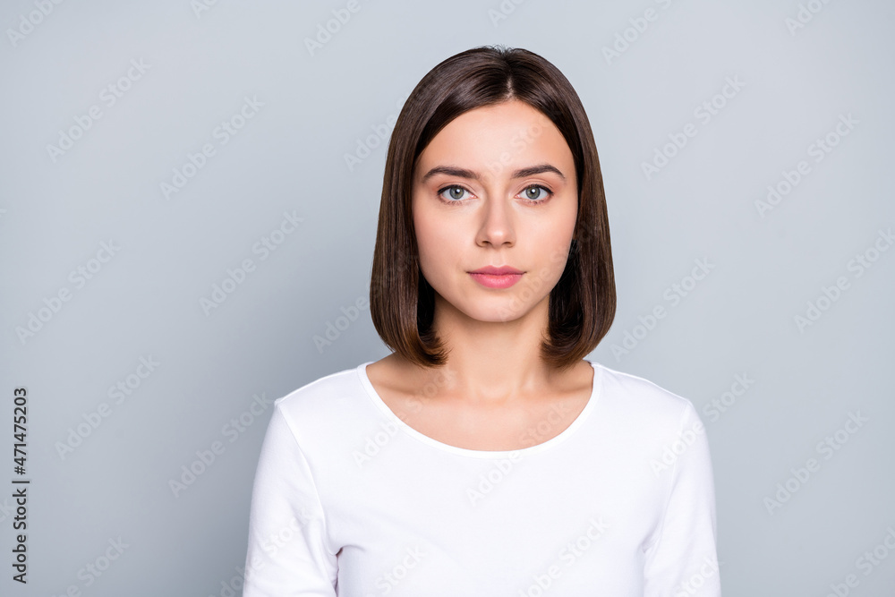 Photo of strict brunette young lady wear white shirt isolated on grey color background