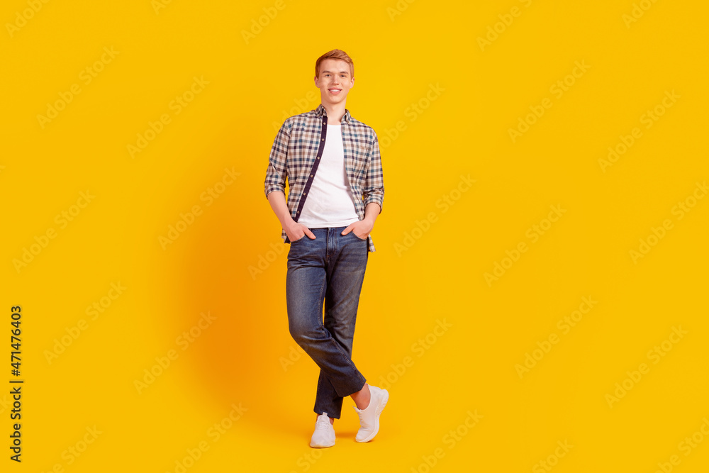 Fototapeta premium Full length photo of young handsome man modern outfit agent economist isolated over yellow color background