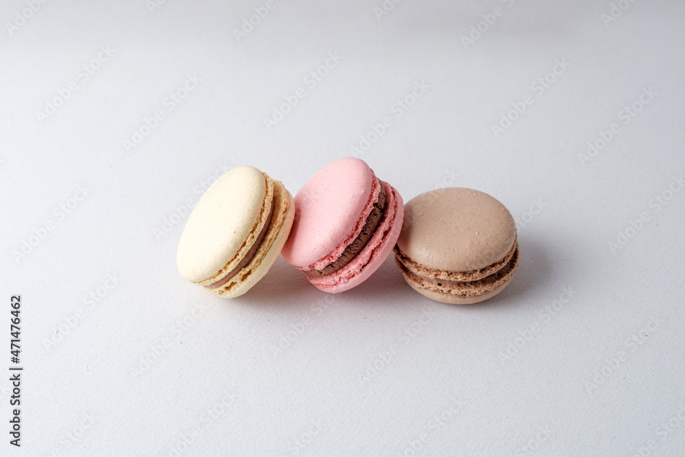 Fototapeta premium three macarons one on top of the other very chocolaty