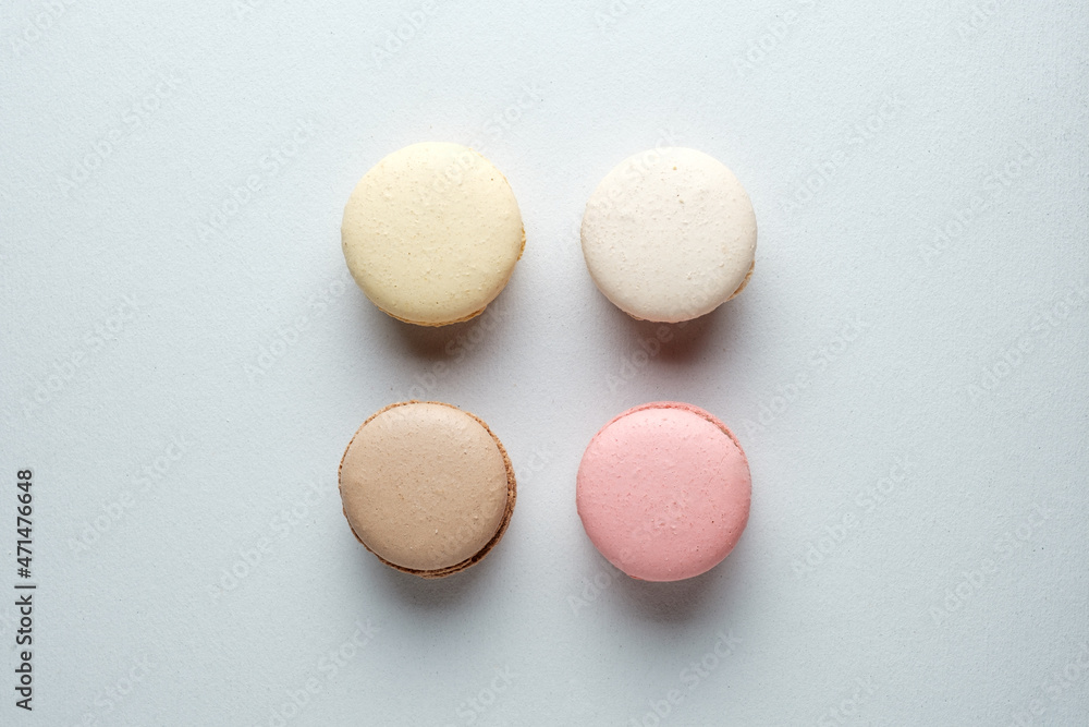 Four aligned macarons of different flavors Four aligned macarons of different flavors